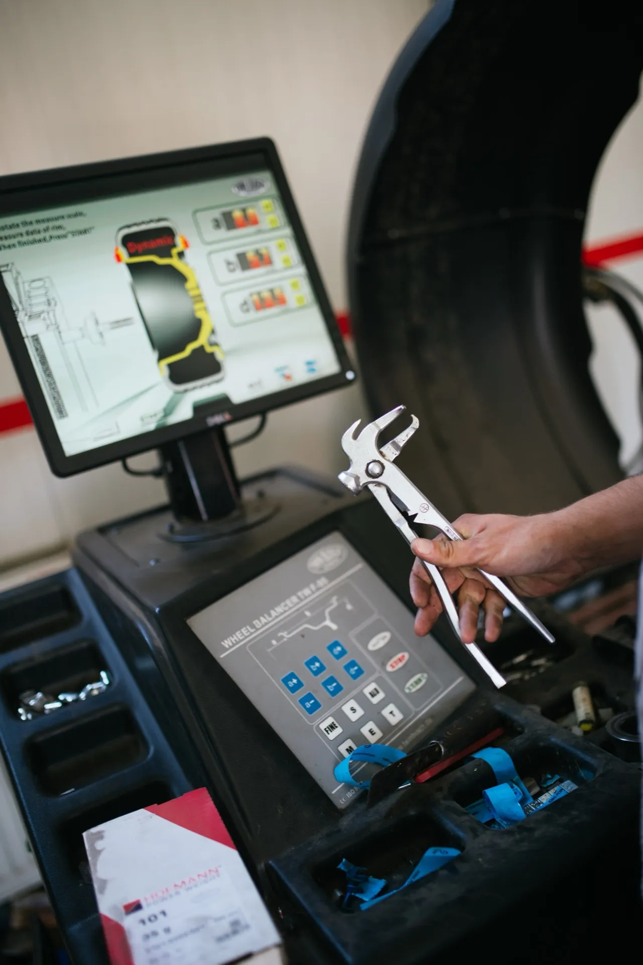 Mechanic using diagnostic equipment during an MOT test at Park Crescent Garage Worthing